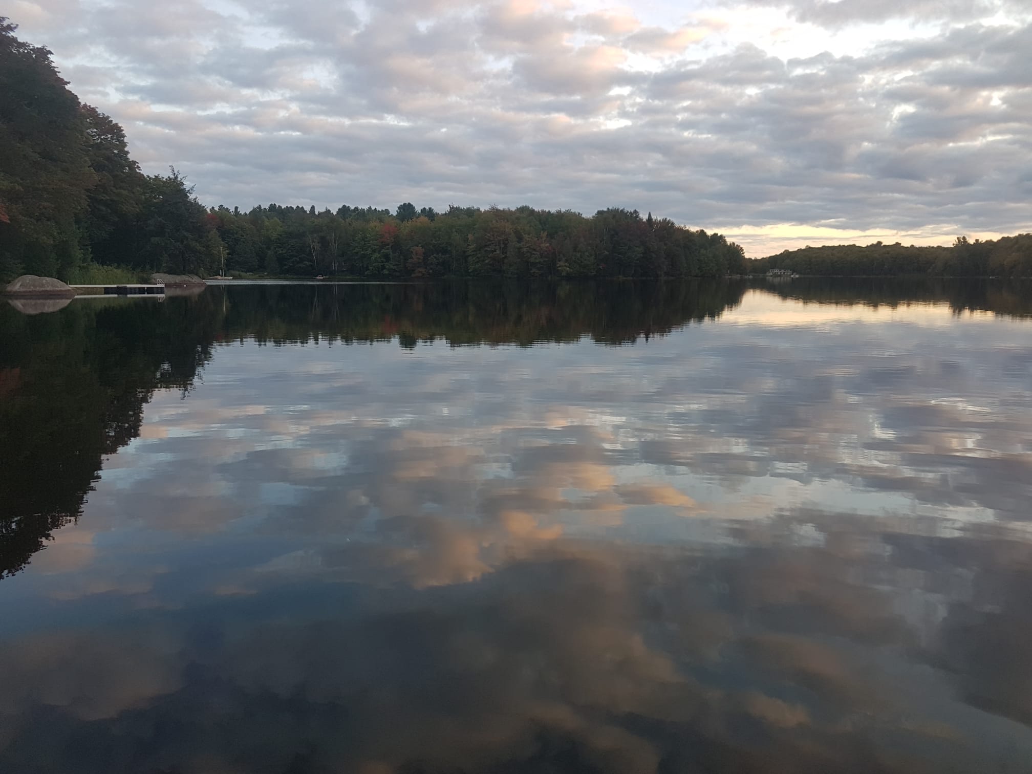 Lake with clouds reflected in water